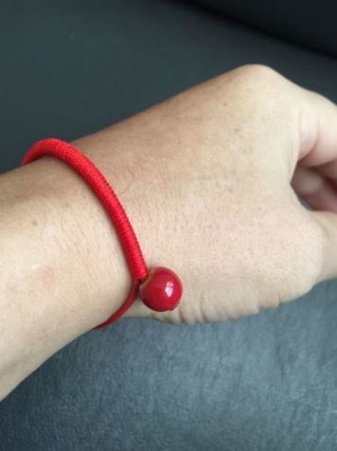 lucky red string bracelet meaning