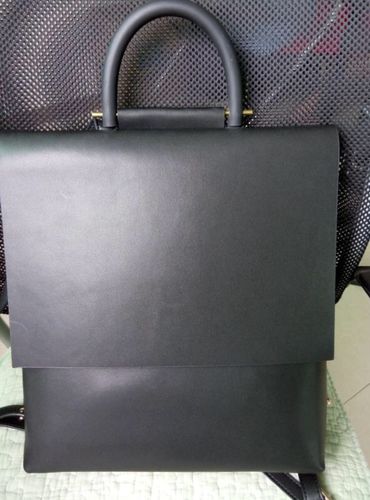 black leather designer backpack