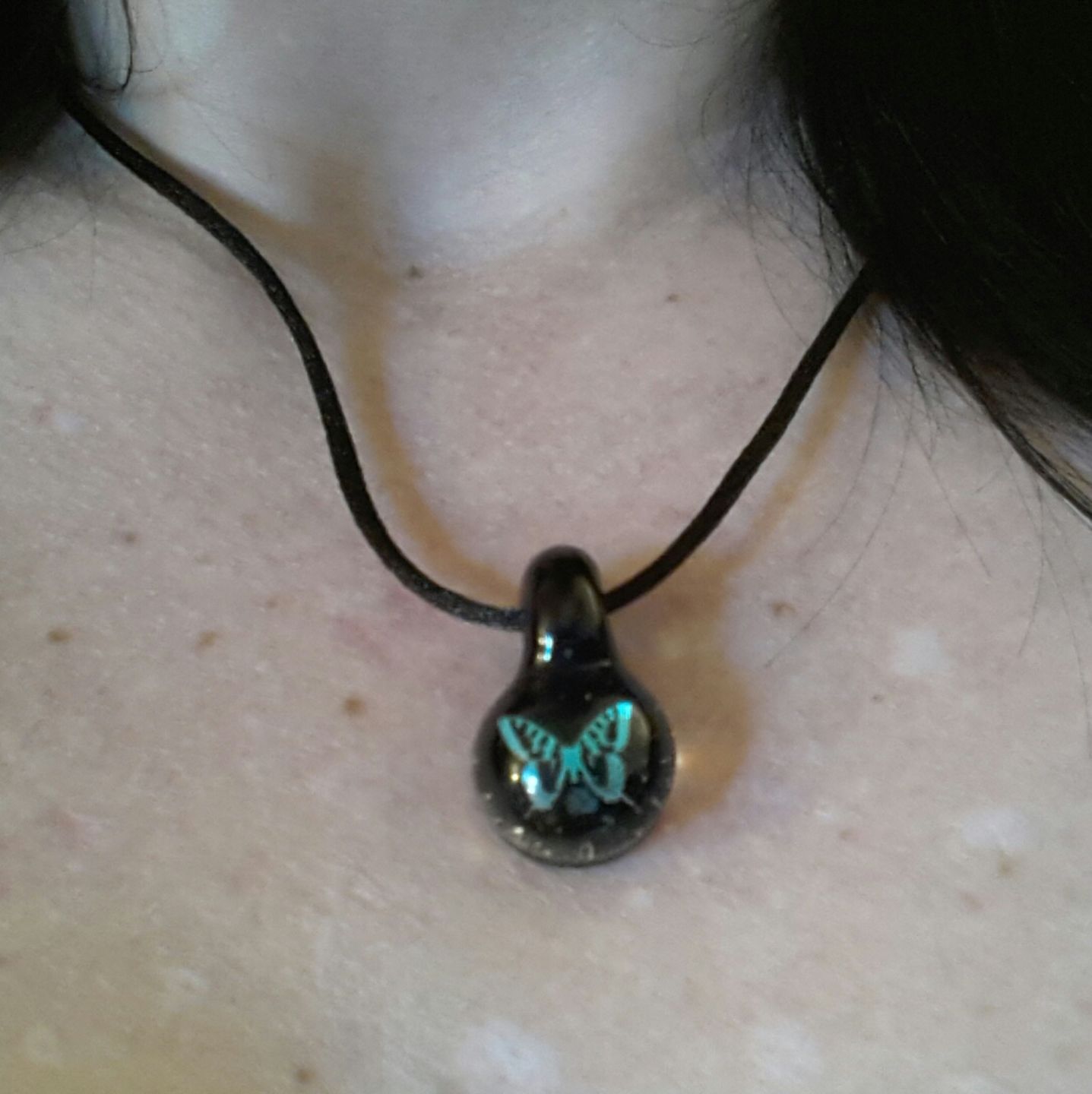 Customer photo review of Butterfly Hologram Pendant with Infused Cremation Ash