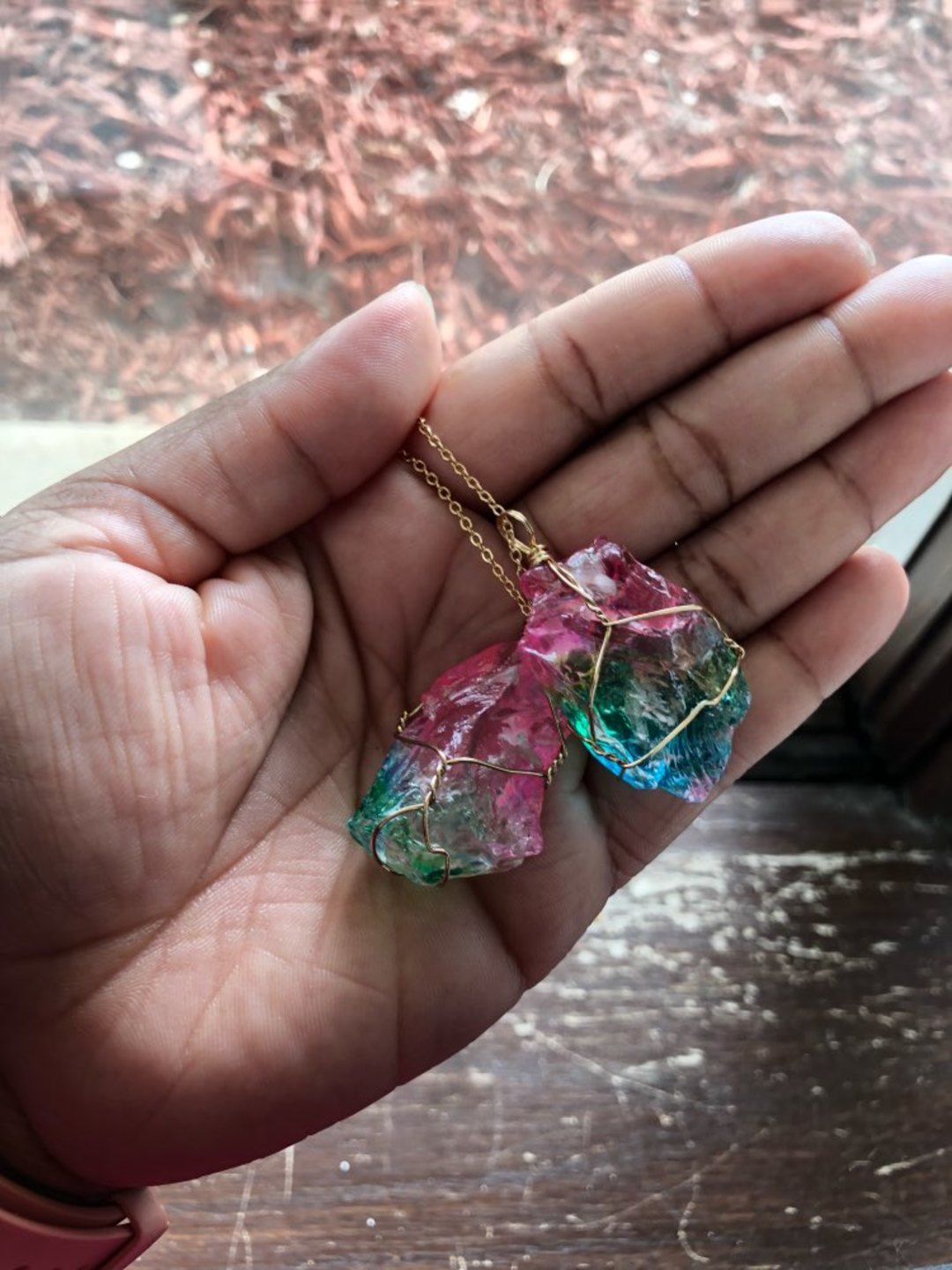 Customer photo review of Aqua Rosa Crystal Pendant