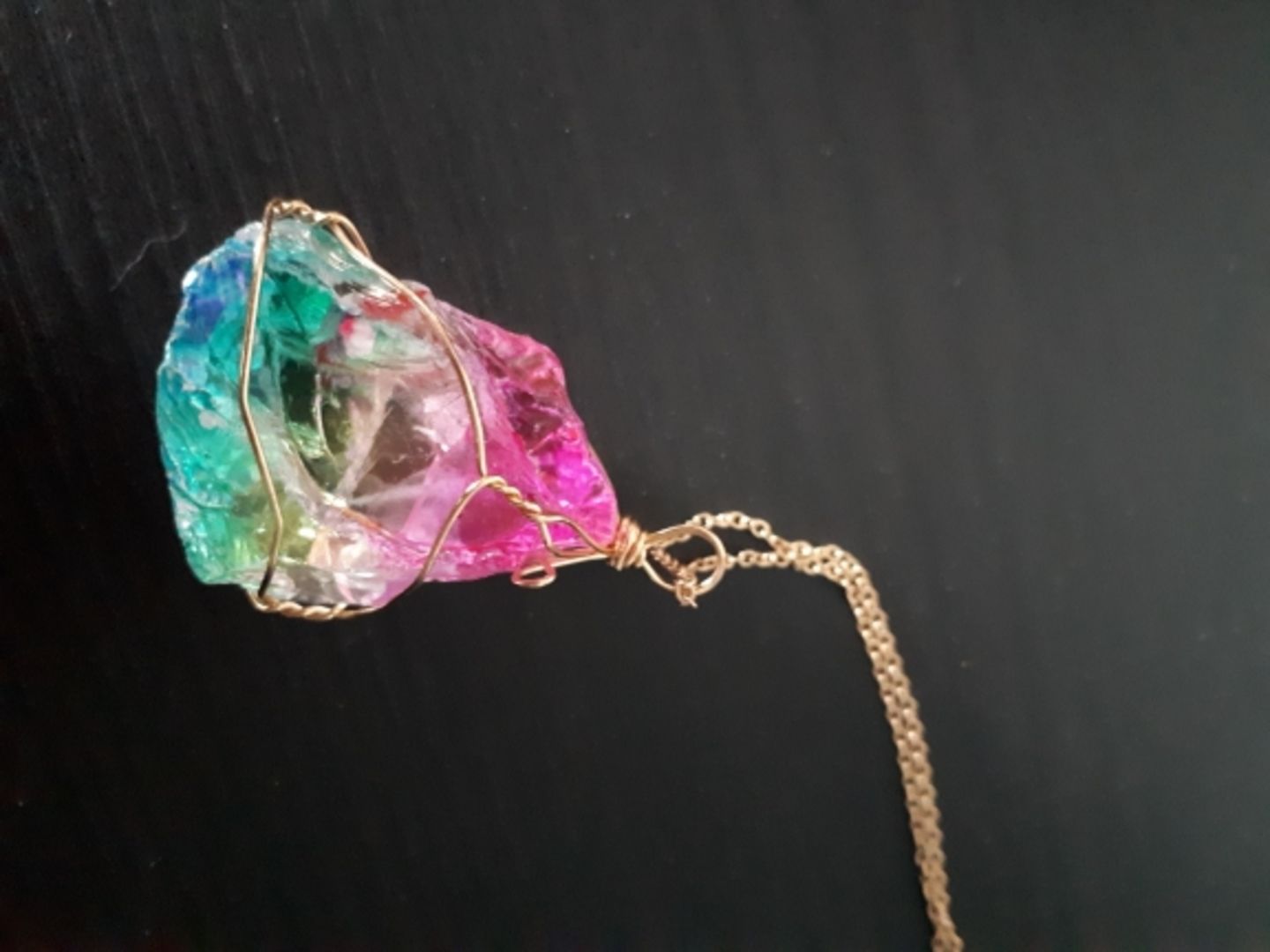 Customer photo review of Aqua Rosa Crystal Pendant