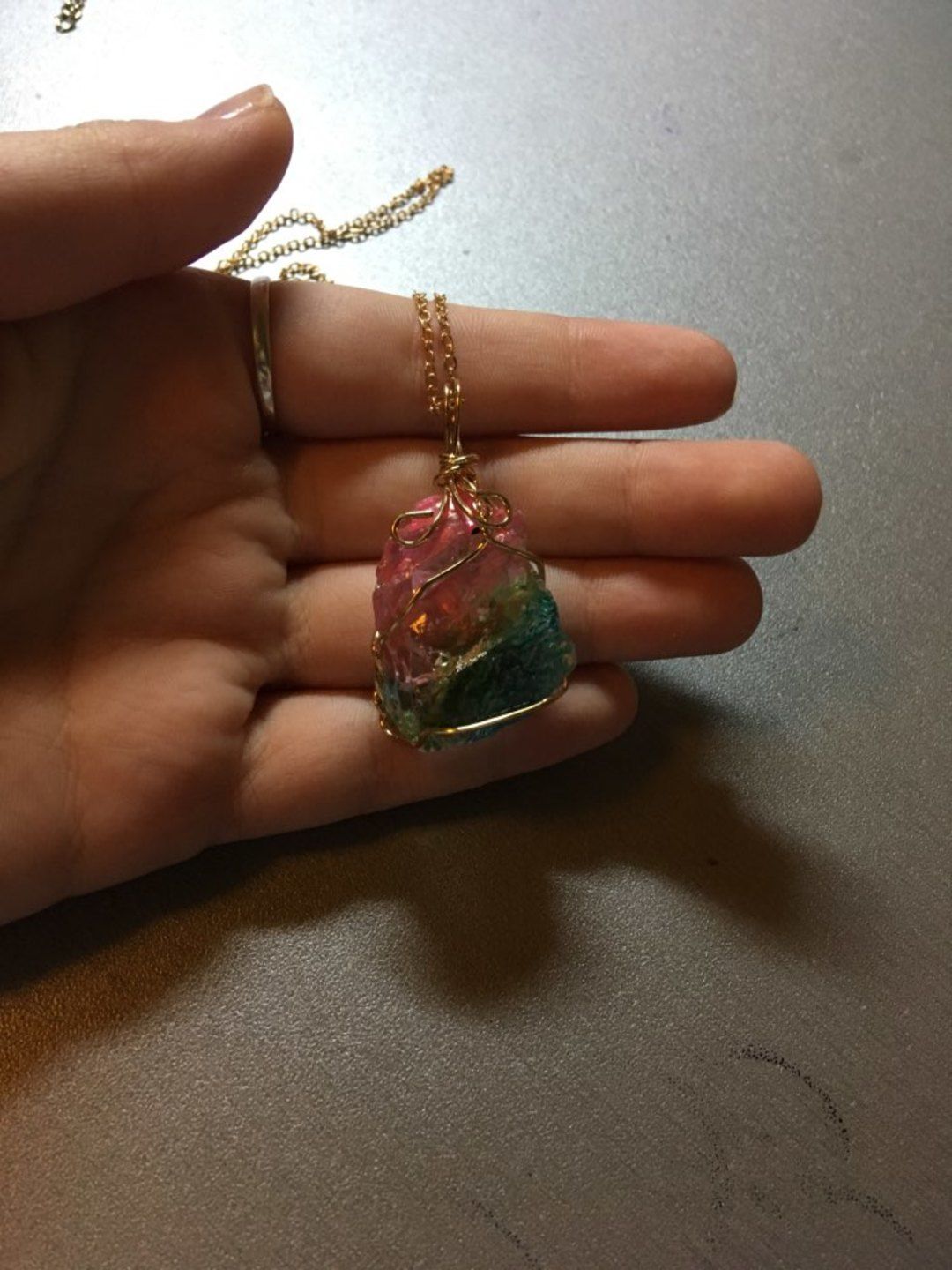 Customer photo review of Aqua Rosa Crystal Pendant