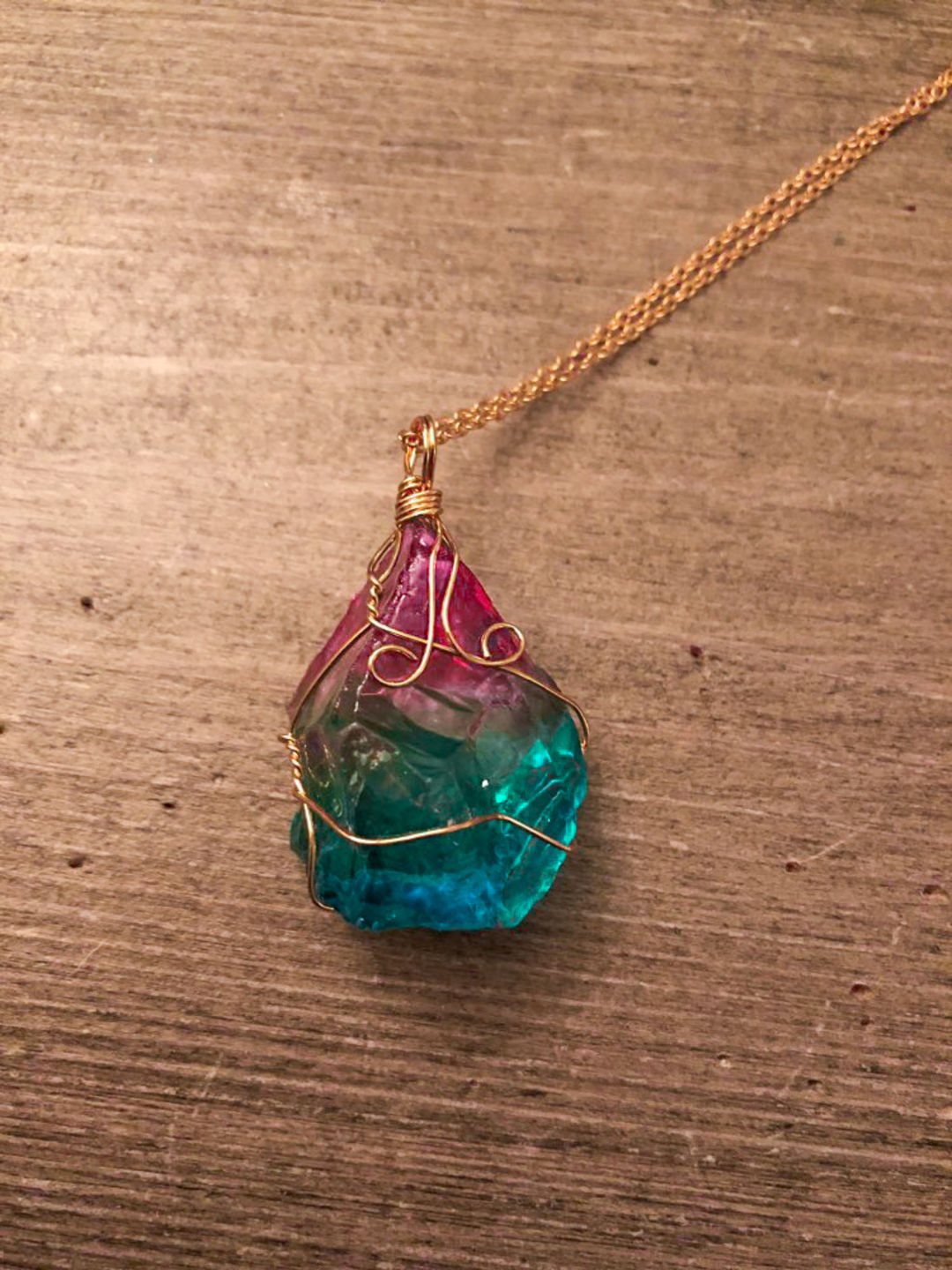 Customer photo review of Aqua Rosa Crystal Pendant
