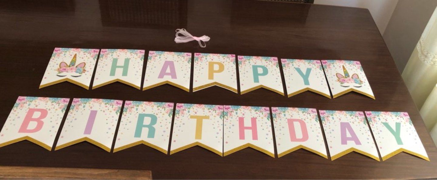 Customer photo review of Pastel Unicorn Happy Birthday Flag Banner with Gold Glitter Tips