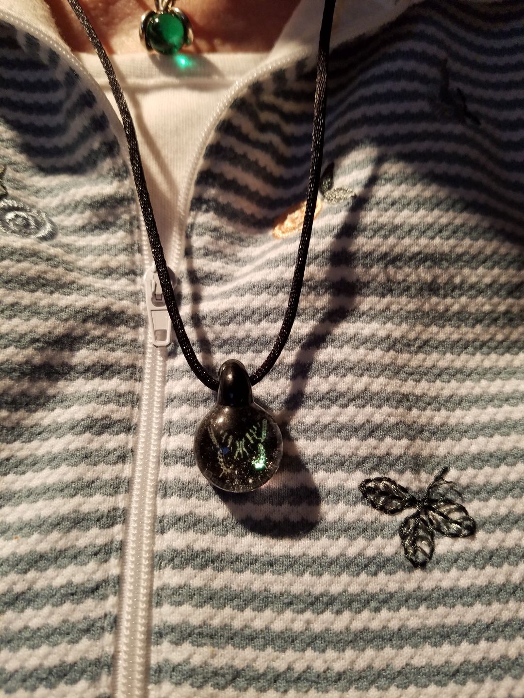 Customer photo review of Butterfly Hologram Pendant with Infused Cremation Ash