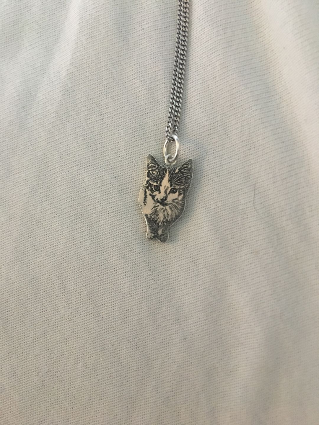 Customer photo review of Personalized Silver Cat Necklace (925 Sterling Silver)