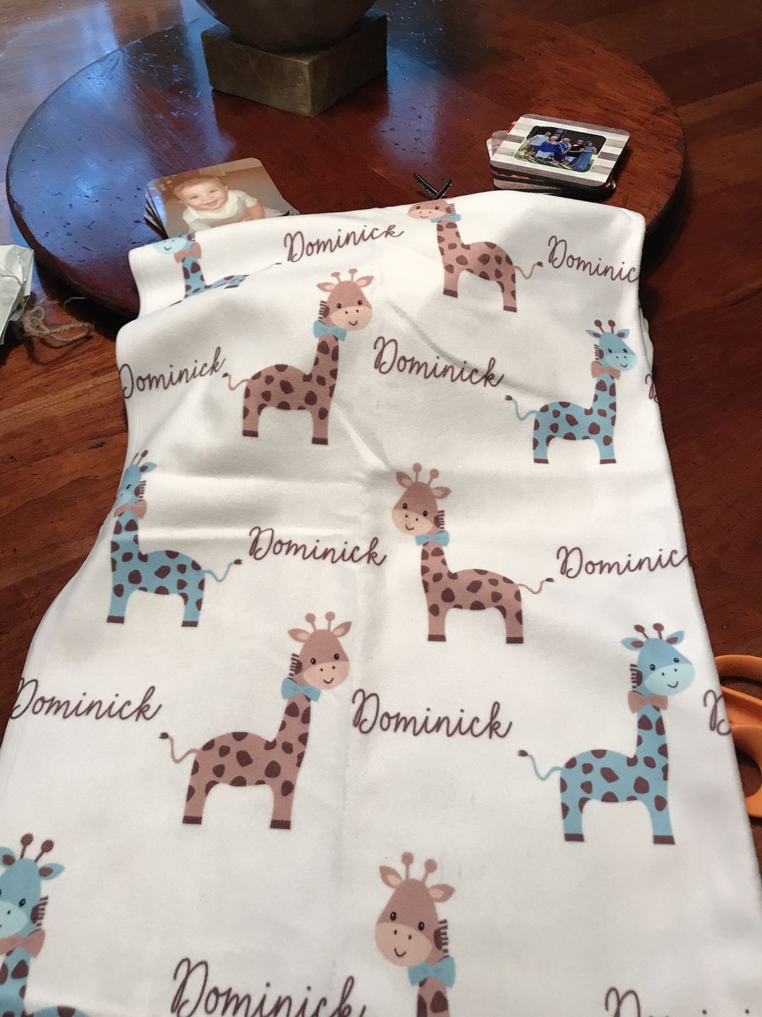 Customer photo review of Giraffe Fleece Personalized Baby Boy Blanket