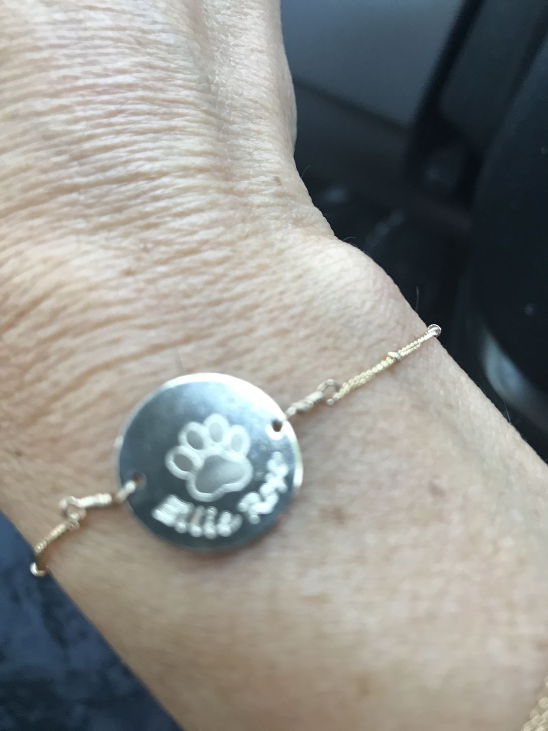 Customer photo review of Personalized Pet Bracelet with Paw Print and Name