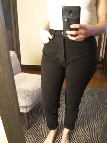 cry baby hugging mom jeans