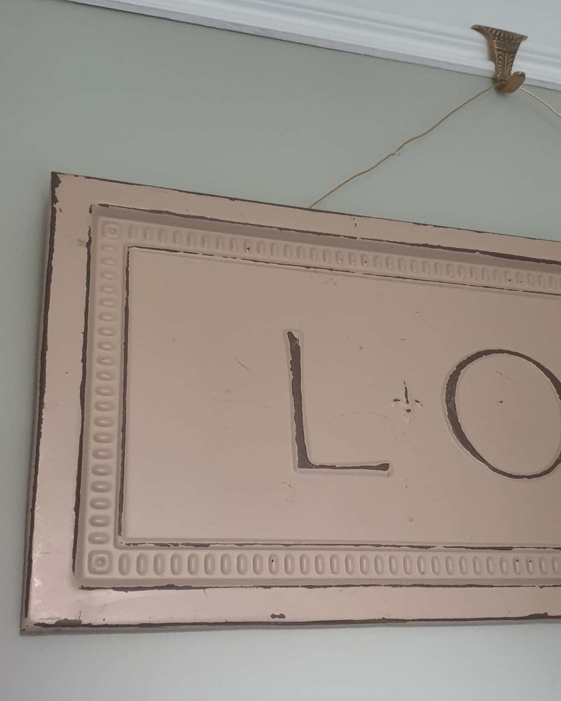 Customer photo review of Brass Picture Rail Hooks