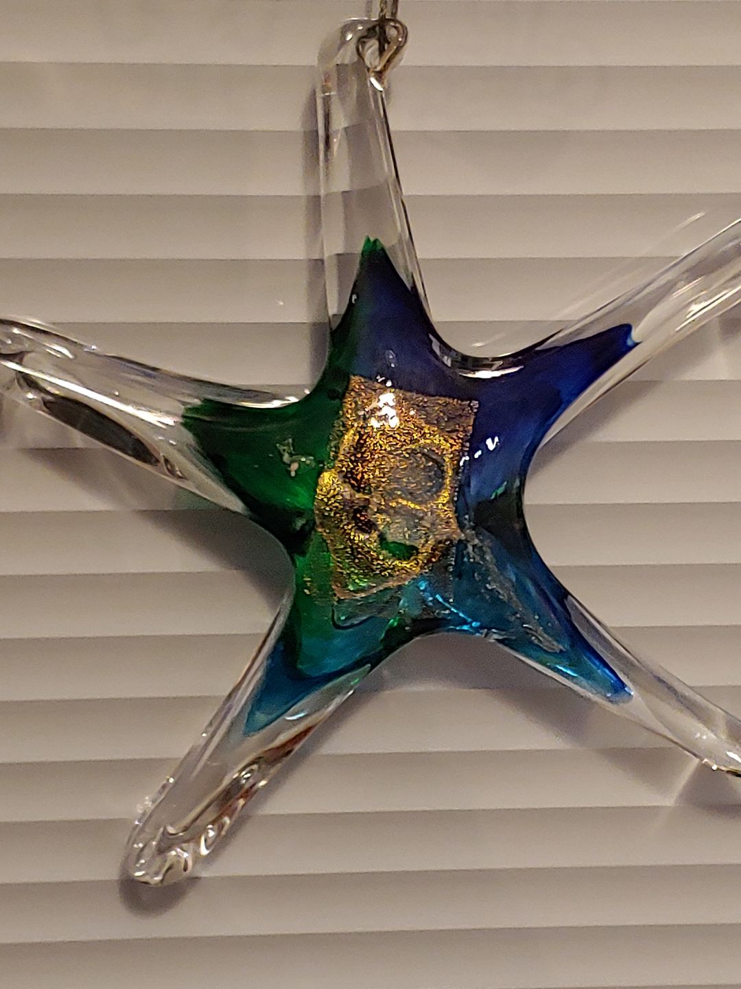 Customer photo review of Dichroic Starfish Suncatcher with Infused Cremains