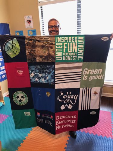 T-shirt quilt with environmental awareness, employee engagement themes by Teresa from TN