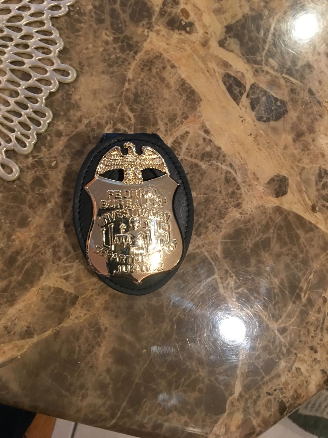 Customer photo review of FBI Department of Justice Badge Solid Copper Replica Movie Props