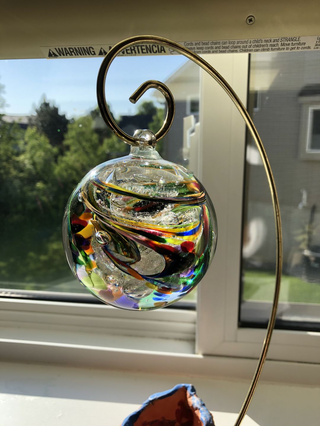 Customer photo review of Rainbow Confetti Orb with Cremation Ashes