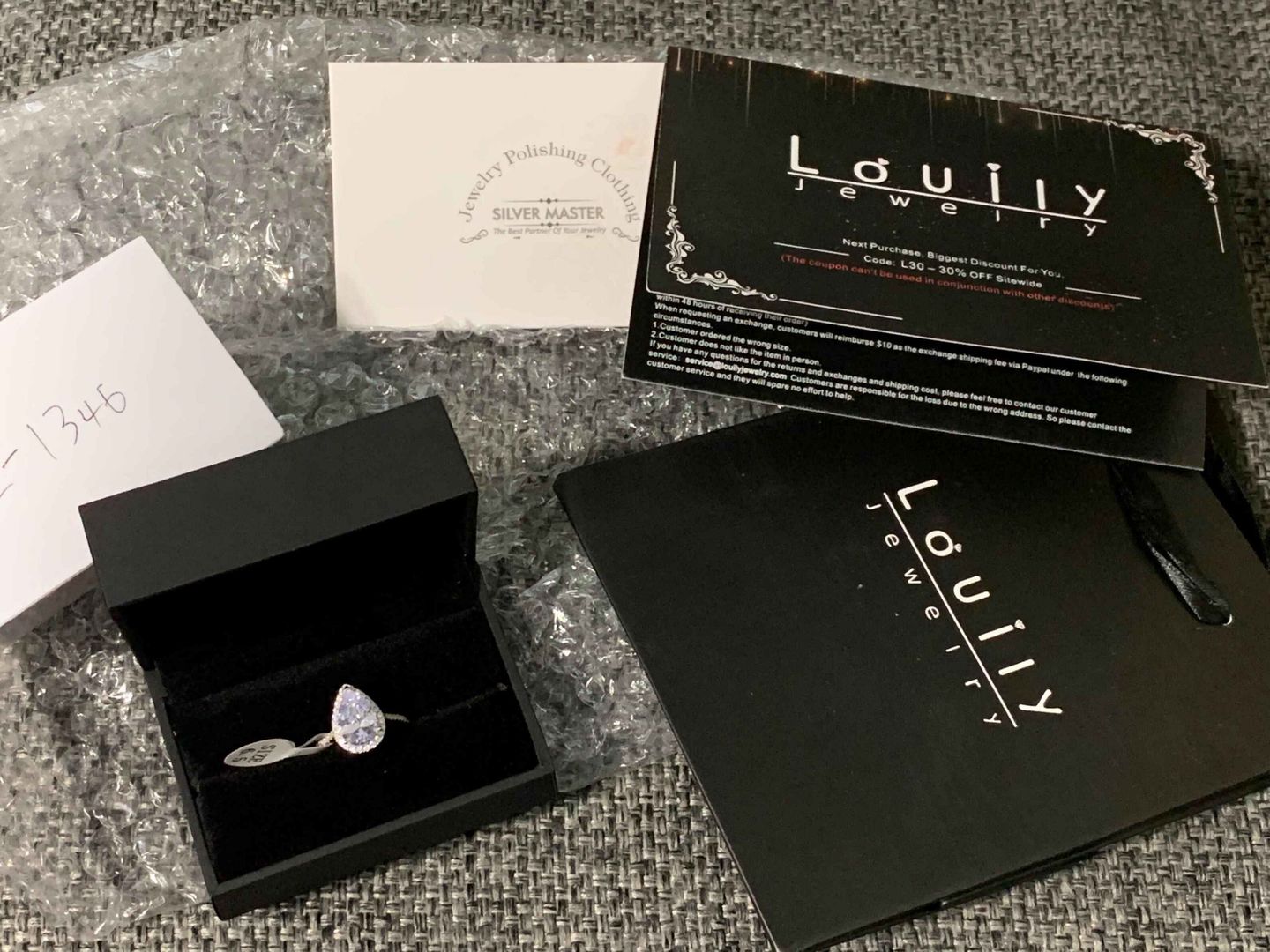 Customer photo review of S925 Halo 2.2Carat Pear Cut Engagement Ring In Sterling Silver Everyday Wearable Ring