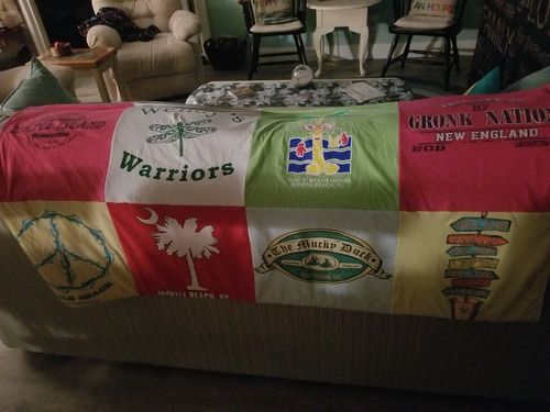 T-shirt quilt with sports, travel themes by Cheryl from NH