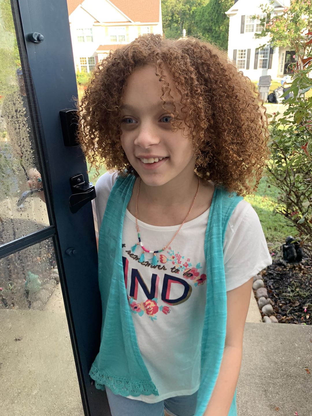 Customer photo review of Curly Hair Moisturizer for Strengthening Hair with Organic Avocado Oil and Organic Castor Oil with Vanilla Berry Fragrance