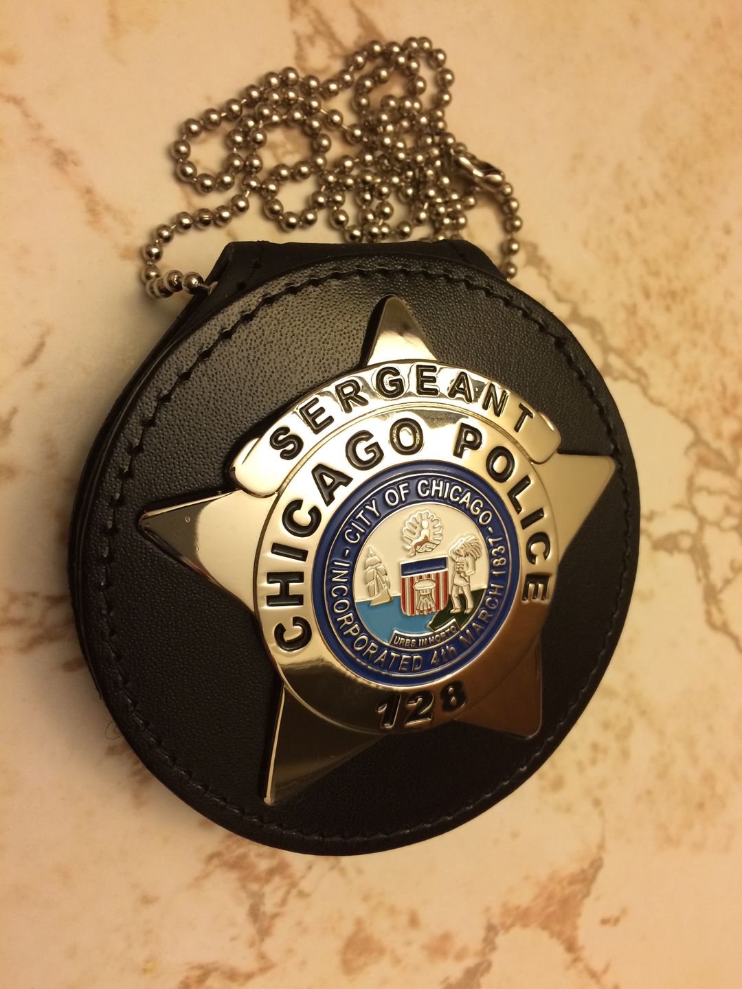 Customer photo review of Chicago Sergeant Police Badge Solid Copper Replica Movie Props With Number 128