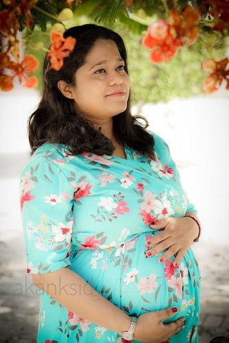 Customer photo review of Baby Blue Floral Maternity & Nursing Wrap Dress