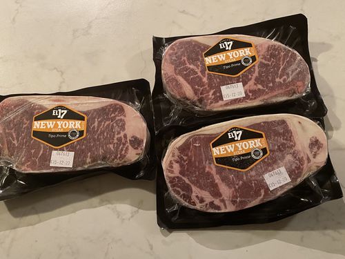 Reseña con foto de un cliente sobre New York Steak
