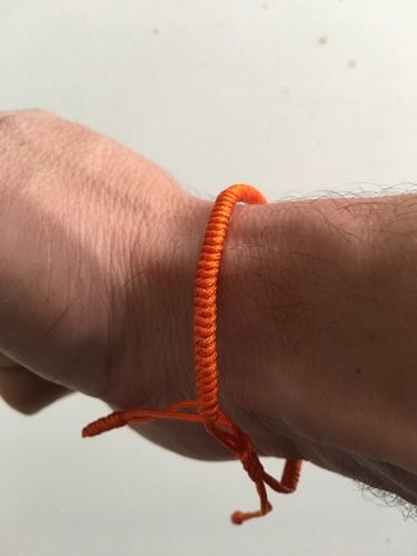 Customer photo review of "Colors of Life" Lucky Handmade Buddhist Knots Rope Bracelet