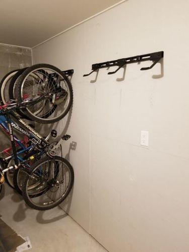 Customer photo review of Koova Wall Mount Bike Storage Rack Garage Hanger for 6 Bicycles + Helmets