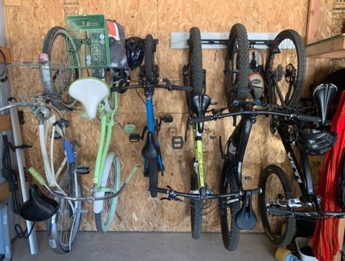 Customer photo review of Koova Wall Mount Bike Storage Rack Garage Hanger for 6 Bicycles + Helmets