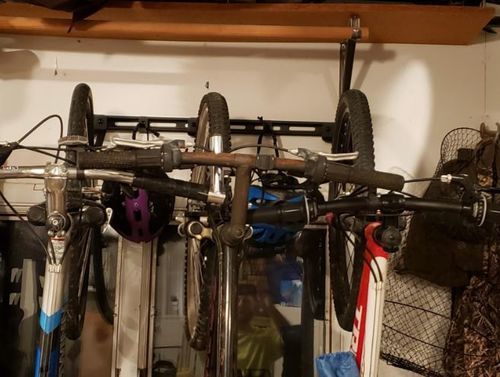 Customer photo review of Koova Wall Mount Bike Storage Rack Garage Hanger for 6 Bicycles + Helmets