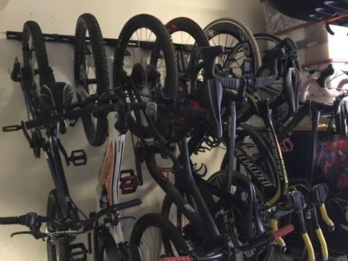 Customer photo review of Koova Wall Mount Bike Storage Rack Garage Hanger for 6 Bicycles + Helmets