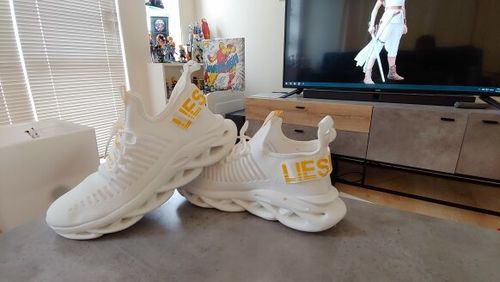 Customer photo review of Lightweight Breathable Blade Running Shoes