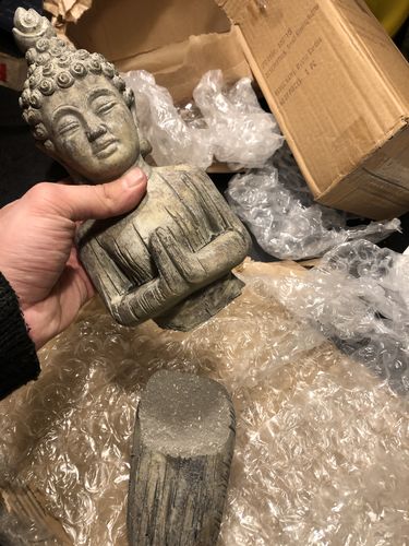 Customer photo review of Small Kneeling Stone Buddha by Stone The Crows