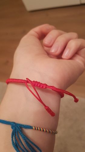 Customer photo review of "Colors of Life" Lucky Handmade Buddhist Knots Rope Bracelet