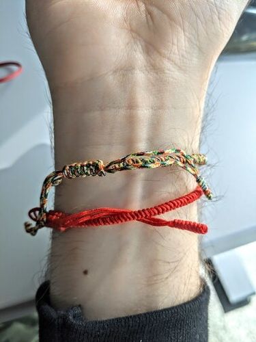 Customer photo review of "Colors of Life" Lucky Handmade Buddhist Knots Rope Bracelet