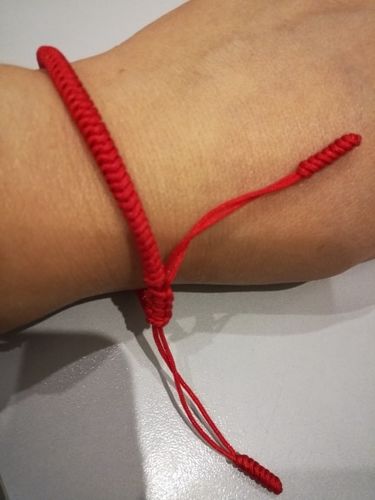 Customer photo review of "Colors of Life" Lucky Handmade Buddhist Knots Rope Bracelet