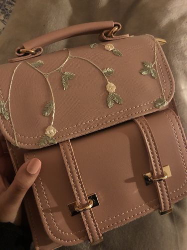 Customer photo review of Floral Embroidery Leather Backpack