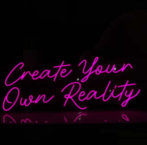 Customer photo review of 'Create Your Own Reality' Neon Sign