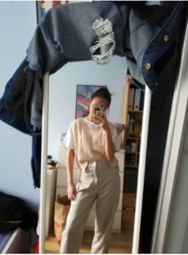 Customer photo review of Pull sans manches torsadé