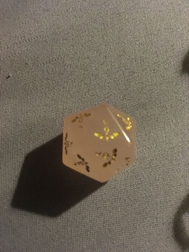 Customer photo review of URWizards Dnd Rose Quartz Gemstone Engraved Dice Set Plant Vine Style