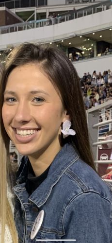 Customer photo review of TRILLIUM STUD EARRINGS