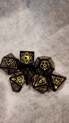 Customer photo review of URWizards Dnd Blue Sandstone Engraved Dice Set Astrology Style Gold Inked
