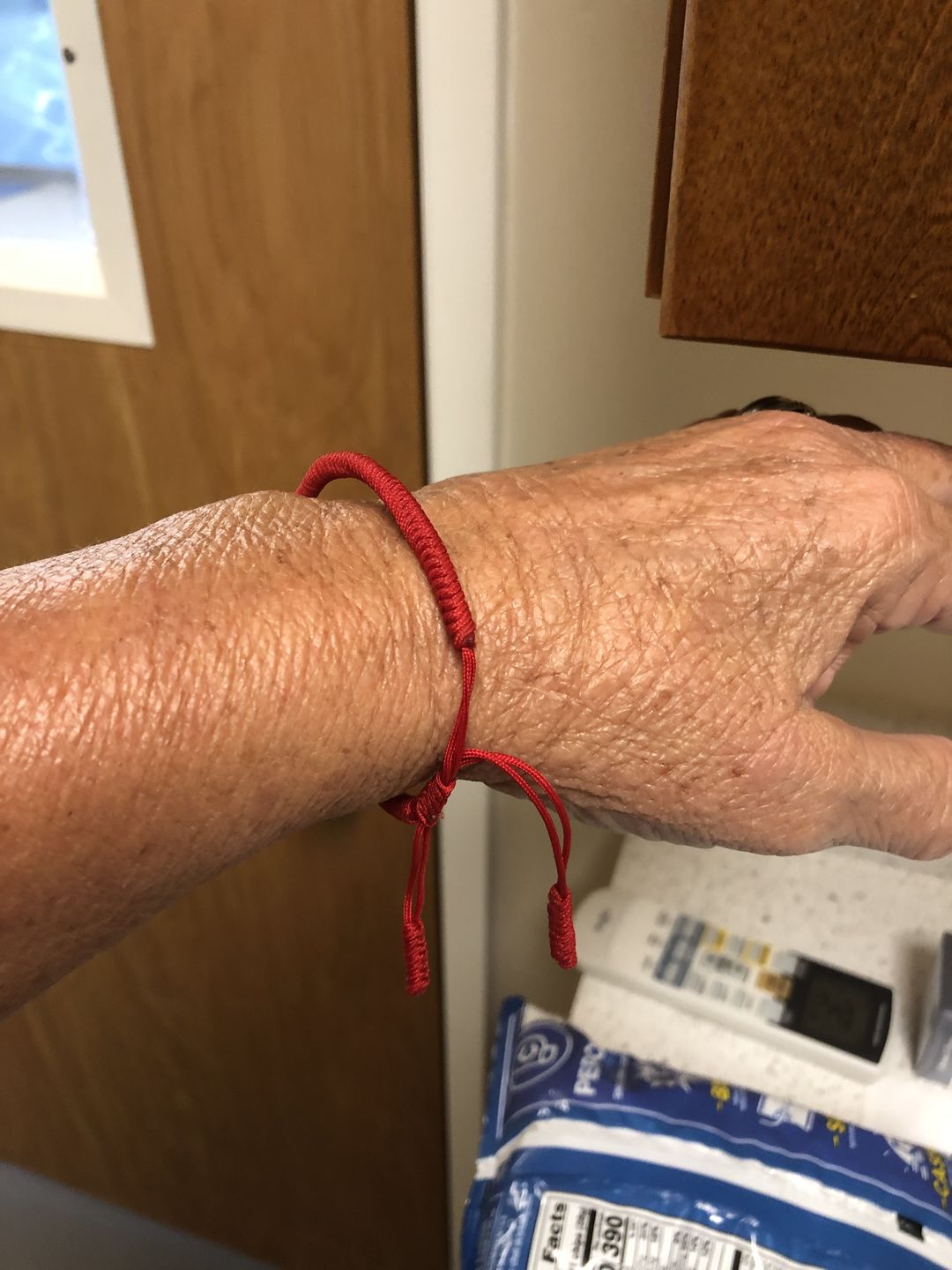 Customer photo review of Tibetan Buddhist Handmade Lucky Knots Bracelet