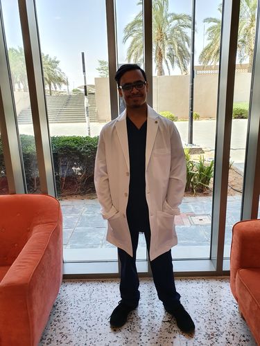 Customer photo review of Men's Spandex V-Neck Wesley Scrub Set