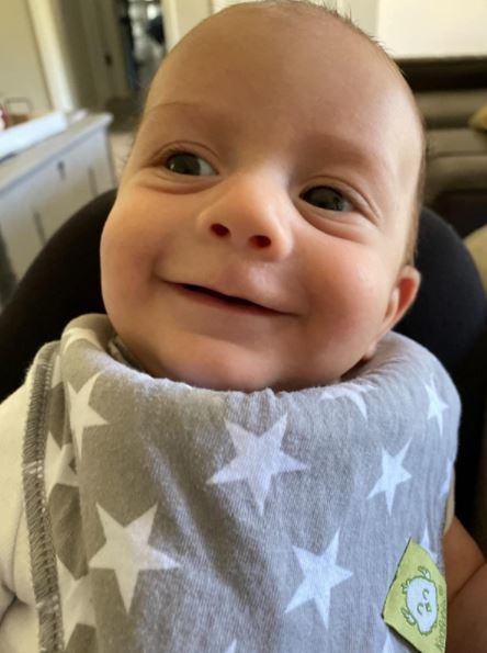 Customer photo review of Organic Baby Bandana Bibs