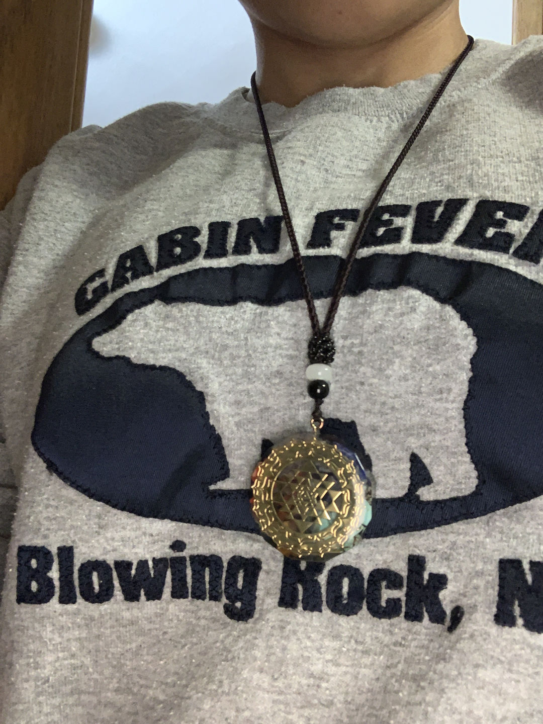 Customer photo review of Sacred Sri Yantra Orgonite Chakra Necklace