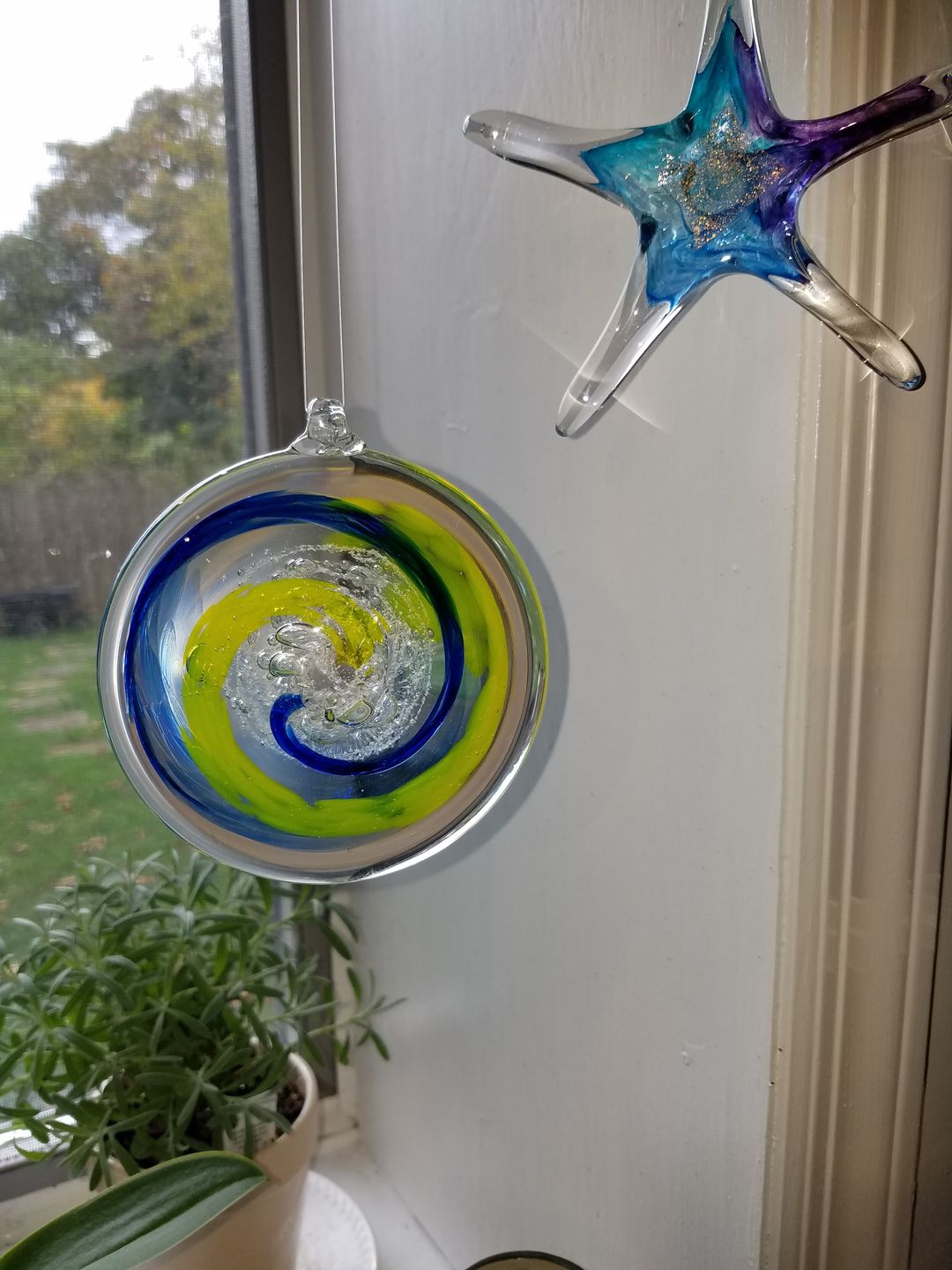 Customer photo review of Glass Suncatcher with Infused Cremation Ash