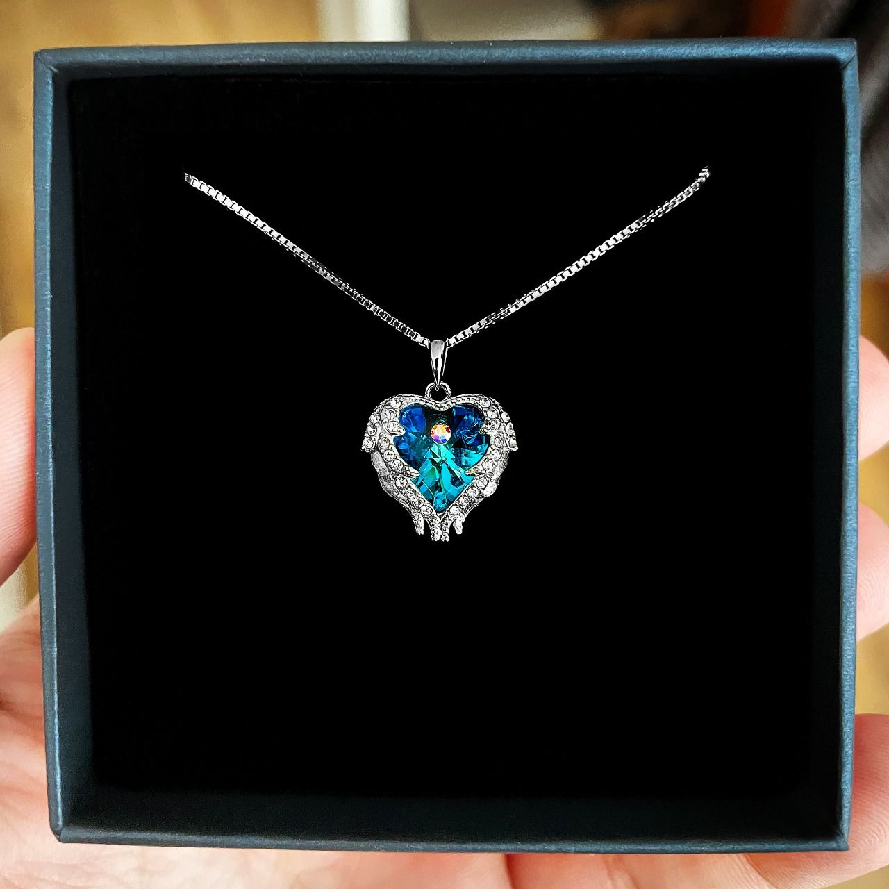 Customer photo review of Guardian Angel Wings Necklace