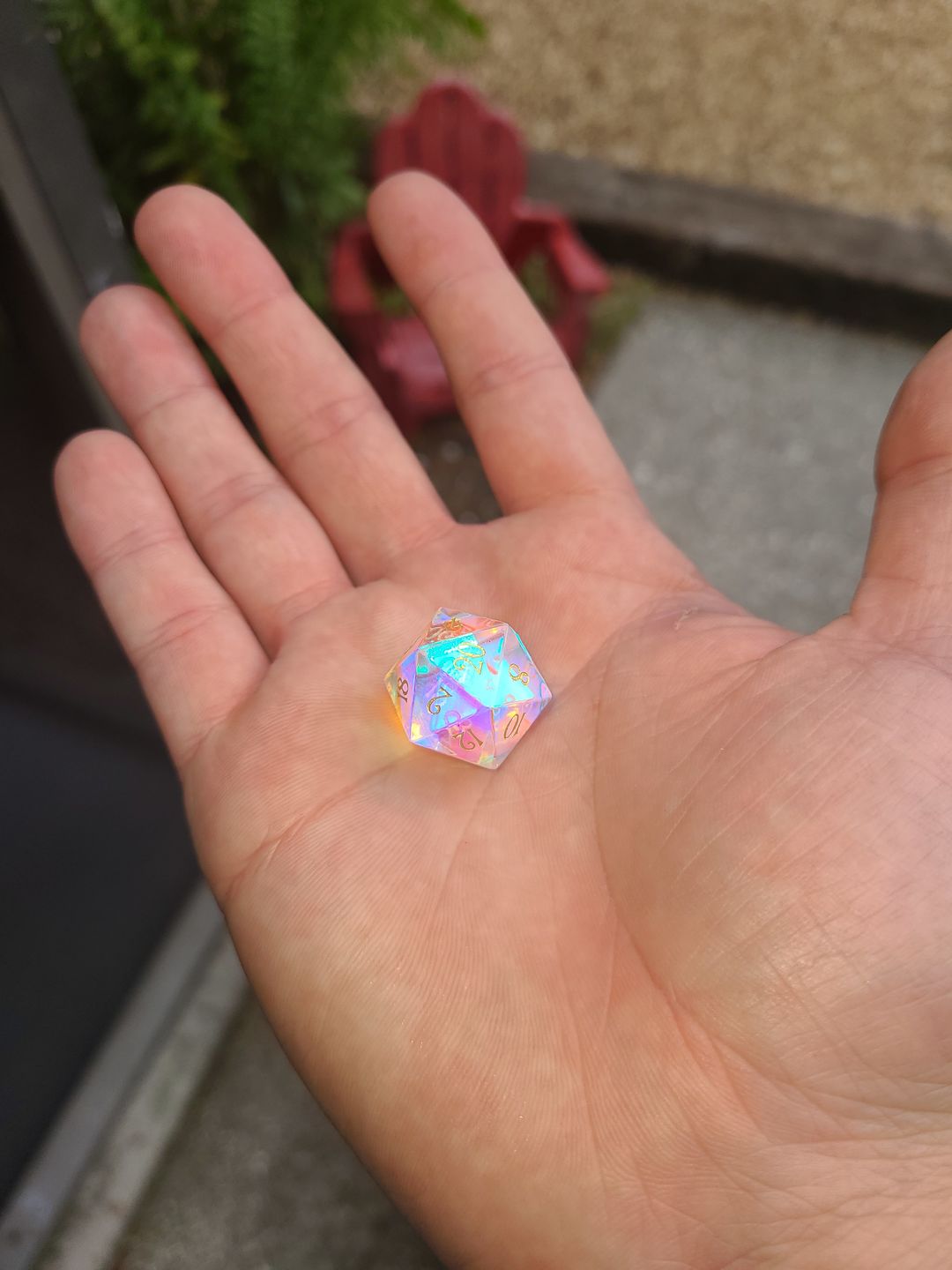 Customer photo review of URWizards Dnd Dichroic Prism Glass Gemstone Engraved Dice Set