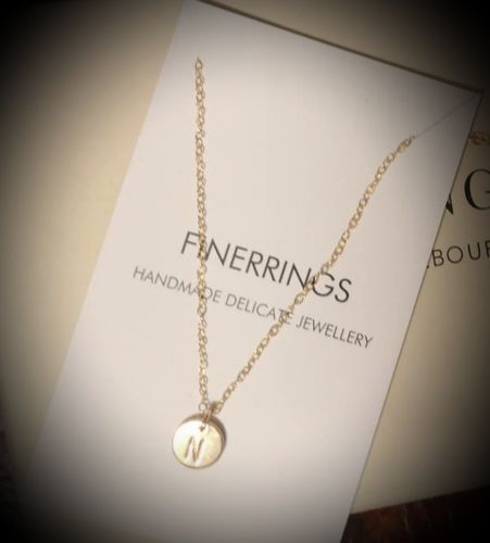 Customer photo review of Circle Stamped Necklace