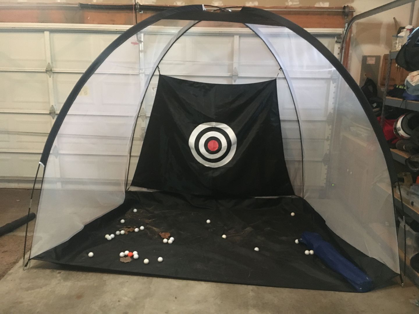 Customer photo review of Golf Practice Driving Net for Indoors and Outdoors | Tri-Turf Hitting Mat