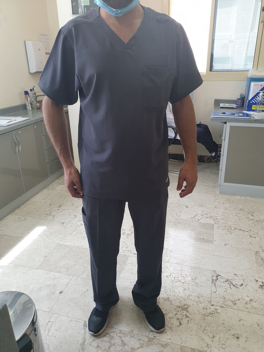 Customer photo review of بلوزة سكتشرز جيب واحد ~One pocket Scrub Top